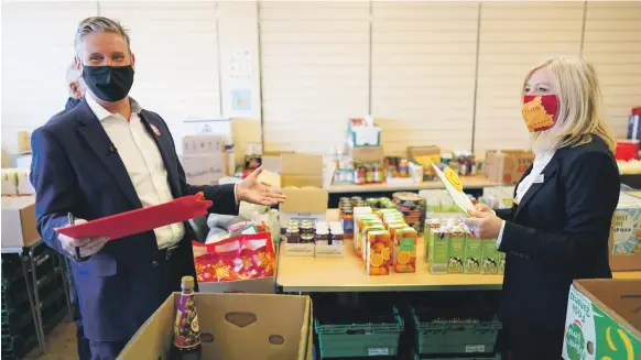  ?? Getty ?? Opposition Labour leader Sir Keir Starmer and MP Tracy Brabin, candidate for the West Yorkshire mayoral election, visit a food bank project in Pontefract