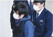  ?? KYODO NEWS VIA AP ?? Tetsuya Yamagami, the alleged assassin of Japan’s former Prime Minister Shinzo Abe, enters a police station Tuesday in Nara, western Japan.