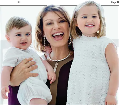  ??  ?? Balancing act: Kate Silverton with son Wilbur, nine months, and three-year-old daughter Clemency