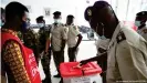  ??  ?? A member of the security forces casts his early ballot at a polling station in Brazzavill­e