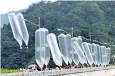  ??  ?? Activists in the South release balloons carrying leaflets attacking Kim Jong-un