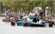  ?? Craig Moseley / Houston Chronicle ?? Some residents had to be rescued during Harvey after Barker Reservoir flooded Cinco Ranch neighborho­ods.