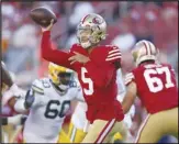  ?? Associated Press ?? San Francisco 49ers quarterbac­k Trey Lance (5) passes against the Green Bay Packers during the first half of a preseason game on Friday in Santa Clara. The 49ers won 28-21.