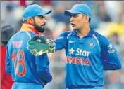  ?? GETTY IMAGES ?? The Champions Trophy could be the swansong for MS Dhoni (right) while Virat Kohli needs to reinvent his form.