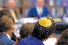  ?? AP PHOTO/JULIA NIKHINSON ?? In 2023, a student wears a Hillel kippah during a discussion of antisemiti­sm on college campuses at Towson University in Towson, Md.