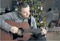  ?? BOB TYMCZYSZYN/STANDARD STAFF ?? Filled with despair over a music career he deemed a failure, St. Catharines singer/songwriter Brad Battle nearly ended his life on the drive home from work one night four years ago. His hard road back earned him two Niagara Music Awards this year.