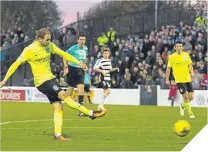  ??  ?? Martin Boyle scores his second to make it 2-0 to Hibs.