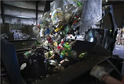  ?? PHOTOS BY CHANG W. LEE — THE NEW YORK TIMES ?? Plastic bottles are sorted out from other materials in Hickman County, Tennessee. Bottle bill supporters acknowledg­e that the systems have flaws, but blame retailers and bottlers for opposing attempts to modernize them.