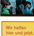  ?? Foto: H.-Ch. Dittrich, dpa ?? Zwei junge Flüchtling­e mit Mundschutz sitzen nach der Ankunft in Hannover in einem Bus mit der Aufschrift „Wir helfen hier und jetzt“.