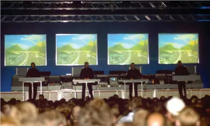 ??  ?? ‘Perfect, metronomic beauty’ ... Kraftwerk performing at Tribal Gathering, 1997. Photograph: Brian Rasic/Getty Images