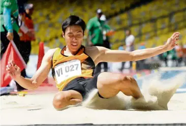  ??  ?? On track for gold: Jonathan Wong Kar Gee has a personal best of 7.22m chalked at the China Open in May. — AZHAR MAHFOF / The Star