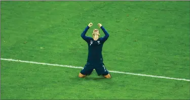  ?? PETER KOVALEV/TRIBUNE NEWS SERVICE ?? France's Antoine Griezmann celebrates victory in the 2018 FIFA World Cup Semi-final match between France and Belgium at Saint Petersburg Stadium on Tuesday in St. Petersburg, Russia.