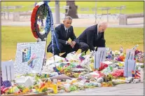  ?? PABLO MARTINEZ MONSIVAIS/ASSOCIATED PRESS ?? President Barack Obama and Vice President Joe Biden on Thursday visit a memorial to the victims of the mass shooting in Orlando, Fla.