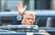  ?? REUTERS ?? Donald Trump waves to supporters as he leaves to attend hush money criminal trial in New York City, on Friday.