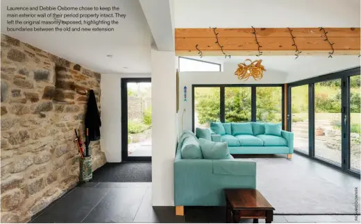  ??  ?? Laurence and Debbie Osborne chose to keep the main exterior wall of their period property intact. They left the original masonry exposed, highlighti­ng the boundaries between the old and new extension