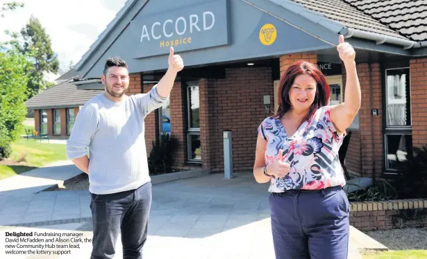  ??  ?? Delighted Fundraisin­g manager David McFadden and Alison Clark, the new Community Hub team lead, welcome the lottery support