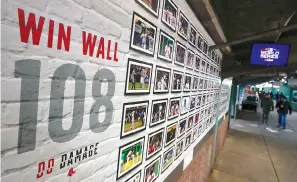  ?? AP Photo/Charles Krupa ?? ■ The Win Wall is seen Monday at Fenway Park in Boston ahead of Game 1 of the World Series between the Boston Red Sox and the Los Angeles Dodgers.