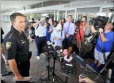  ?? WILL DICKEY — THE FLORIDA TIMES-UNION VIA AP ?? Jacksonvil­le Sheriff Mike Williams addresses the media across the street from the scene of a multiple shooting at The Jacksonvil­le Landing during a video game tournament, Sunday in Jacksonvil­le, Fla.