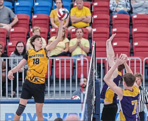  ?? J.J. LaBella/Tri-State Sports & News Service ?? Outside hitter Andrew Feeley plays the ball in Montour’s Class 2A championsh­ip victory Wednesday against Our Lady of the Sacred Heart at UPMC Events Center.