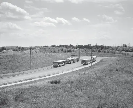  ?? TONY FOUHSE’S SUBURB ?? End of the line. The photograph­er’s landscapes illustrate the delicate balance between developmen­t and nature.