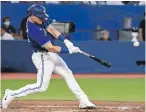  ?? JON BLACKER, THE CANADIAN PRESS ?? Blue Jays third baseman Matt Chapman blasts a three-run home run against the Royals during the fifth inning in Toronto on Friday.