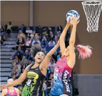  ?? Photo / Photosport ?? It was physical at each end of the court as Pulse defender Kelera Nawai (left) and Steel goal shoot George Fisher illustrate here.