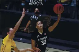  ?? JED JACOBSOHN — THE ASSOCIATED PRESS ?? Stanford’s Haley Jones shoots against California’s Sela Heide during the second half on Sunday in Berkeley.