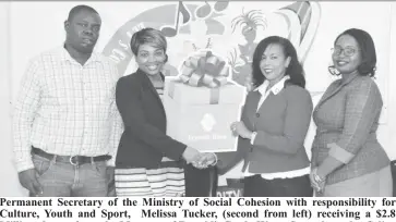  ??  ?? Permanent Secretary of the Ministry of Social Cohesion with responsibi­lity for Culture, Youth and Sport, Melissa Tucker, (second from left) receiving a $2.8 Million cheque from the Manager of Republic Bank, Water Street branch, Celine Davis Also in...