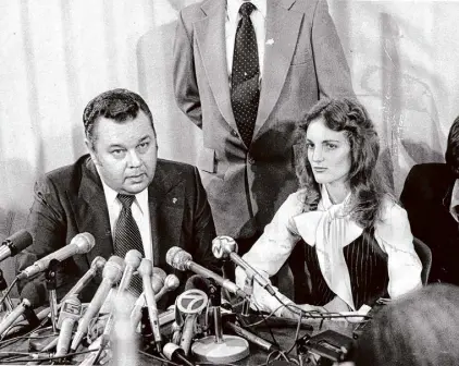  ?? Bill Young/The Chronicle ?? Attorney Albert Johnson and Patty Hearst hold a news conference on April 11, 1977. She served 22 months before President Jimmy Carter commuted her sentence, setting her free in 1979.