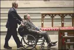  ?? AP ?? Former US presidents George W. Bush (left) and his father George H.W. Bush arrive at St. Martin’s Episcopal Church in Houston for a funeral service for former first lady Barbara Bush on Saturday.