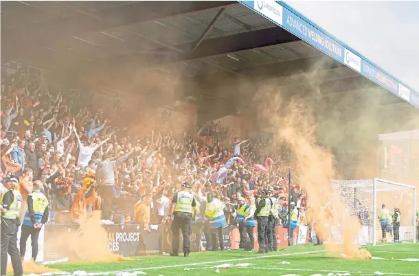  ?? ?? DIFFERENT CLASS: Coach Adam Asghar is proud of the relationsh­ip he has with the Dundee United fans.