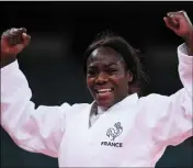  ?? (Photo AFP) ?? La double championne olympique française Clarisse Agbégnénou (-63 kg) est accompagné­e de sa fille Athéna, âgée de dix mois, pour ces Mondiaux.