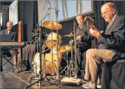  ?? JEREMY FRASER/CAPE BRETON POST ?? The Carl Getto Jazz Trio perform during the inaugural Cape Breton University President’s Leadership Dinner at the Canada Games Complex in Sydney on Monday. From left, Carl Getto, Johnny Hawkins and Red Mike MacDonald.