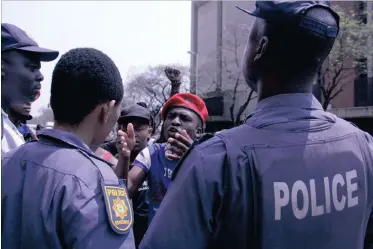  ?? PICTURE: SELAOTSWE FOFO LEREFOLO ?? BLOODY MESS: Students attempt to disrupt a media briefing held by Minister Blade Nzimande at the Department of Higher Education in Pretoria. Protests at universiti­es are impacting on blood donations.