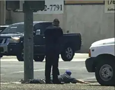  ?? PHOTO COURTESY OF JOAQUIN GARCIA ?? Brawley shooting suspect Eduardo Tolentino, 27, was taken into custody at about 2 p.m. Friday in the area of Fourth Street and Main Street in El Centro by El Centro police officers.