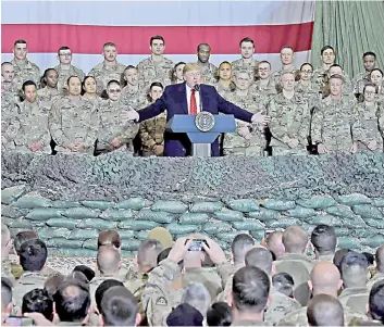  ?? Photo — AFP file ?? Trump speaking to US troops during a surprise Thanksgivi­ng day visit at Bagram Air Field,in Afghanista­n.