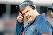  ?? AP-Rogelio V. Solis ?? Mississipp­i head coach Matt Luke removes his headset during a game against Mississipp­i State, in Starkville, Miss.