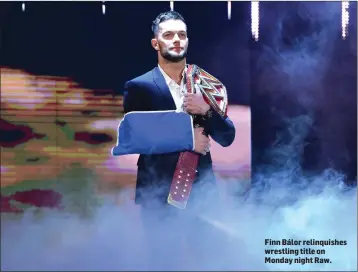  ??  ?? Finn Bálor relinquish­es wrestling title on Monday night Raw.