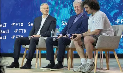  ?? Photograph: YouTube ?? Tony Blair, Bill Clinton and Sam Bankman-Fried on stage at the Crypto Bahamas conference in April this year.