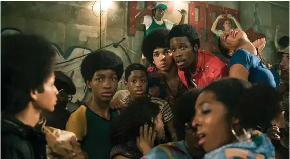  ?? Myles Aronowitz / Netflix ?? “The Get Down” is about the undergroun­d Bronx origins of hip-hop. The Netflix show features a young cast, mostly of color.