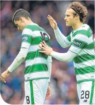  ??  ?? Erik Sviatchenk­o consoles Tom Rogic after his penalty miss cost Celtic a place in the 2016 Cup Final