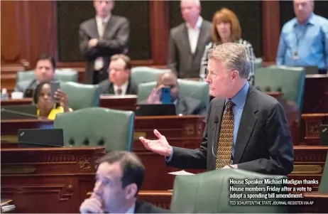  ?? TED SCHURTER/ THE STATE JOURNAL- REGISTER VIA AP ?? House Speaker Michael Madigan thanks House members Friday after a vote to adopt a spending bill amendment.