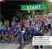  ??  ?? Get ready Over 700 cyclists squeeze into the starting point near Kirklandpa­rk Primary