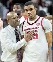  ?? NWA Democrat-Gazette/BEN GOFF ?? Coach Mike Anderson consoles freshman forward Reggie Chaney after Arkansas lost 78-77 to Western Kentucky on Saturday at Walton Arena in Fayettevil­le. The Razorbacks will face Texas-San Antonio on Saturday at Verizon Arena in North Little Rock.