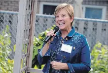  ?? PAUL FORSYTH TORSTAR ?? Hospice Niagara executive director Carol Nagy told a gathering at a community garden event in Niagara Falls that her agency is thrilled to get the funding it's sought for years to start a music therapy program.