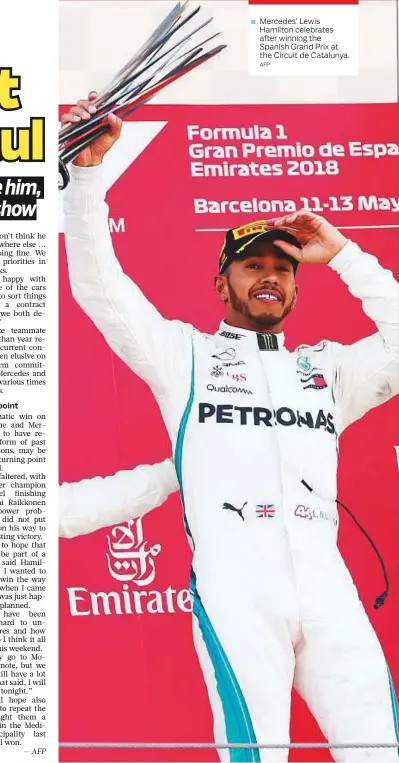  ?? AFP ?? Mercedes’ Lewis Hamilton celebrates after winning the Spanish Grand Prix at the Circuit de Catalunya.