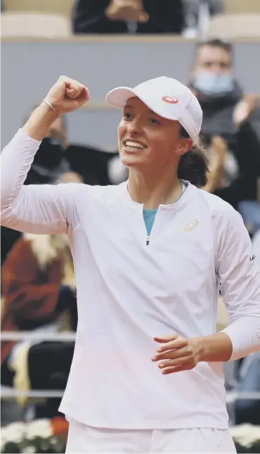  ??  ?? 0 Polish teenager Iga Swiatek celebrates after her semi-final win over Argentina’s Nadia Podoroska.