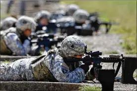  ?? MARK HUMPHREY / ASSOCIATED PRESS 2012 ?? Female soldiers from 1st Brigade Combat Team, 101st Airborne Division train in Fort Campbell, Ky. A federal court upheld the constituti­onality of the all-male military draft system, citing a 1981 U.S. Supreme Court decision.