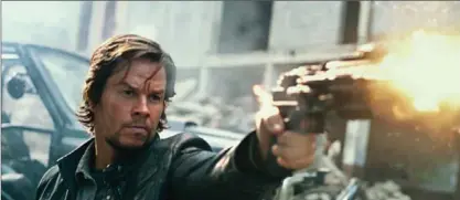  ?? BAY FILMS, PARAMOUNT PICTURES ?? Mark Wahlberg returns as Cade Yeager in a scene from, “Transforme­rs: The Last Knight.”