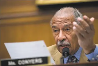 ?? Drew Angerer / Getty Images ?? Rep. John Conyers of Michigan, the top Democrat on the powerful House Judiciary Committee, stressed that he did not admit fault in the case. He has denied any wrongdoing.